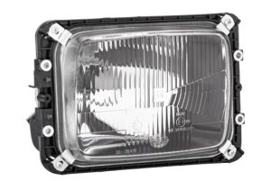 Proiector universal HELLA 1AE 003 440-461, parte montare dreapta, becuri H4, T4W, alimentare 12/24 V, 3 functii luminoase, pentru trafic pe dreapta